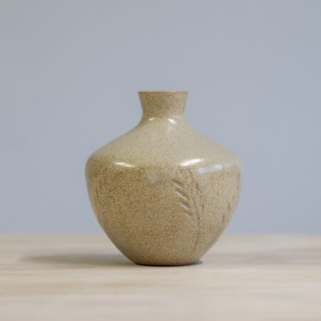 Bud vase in sand